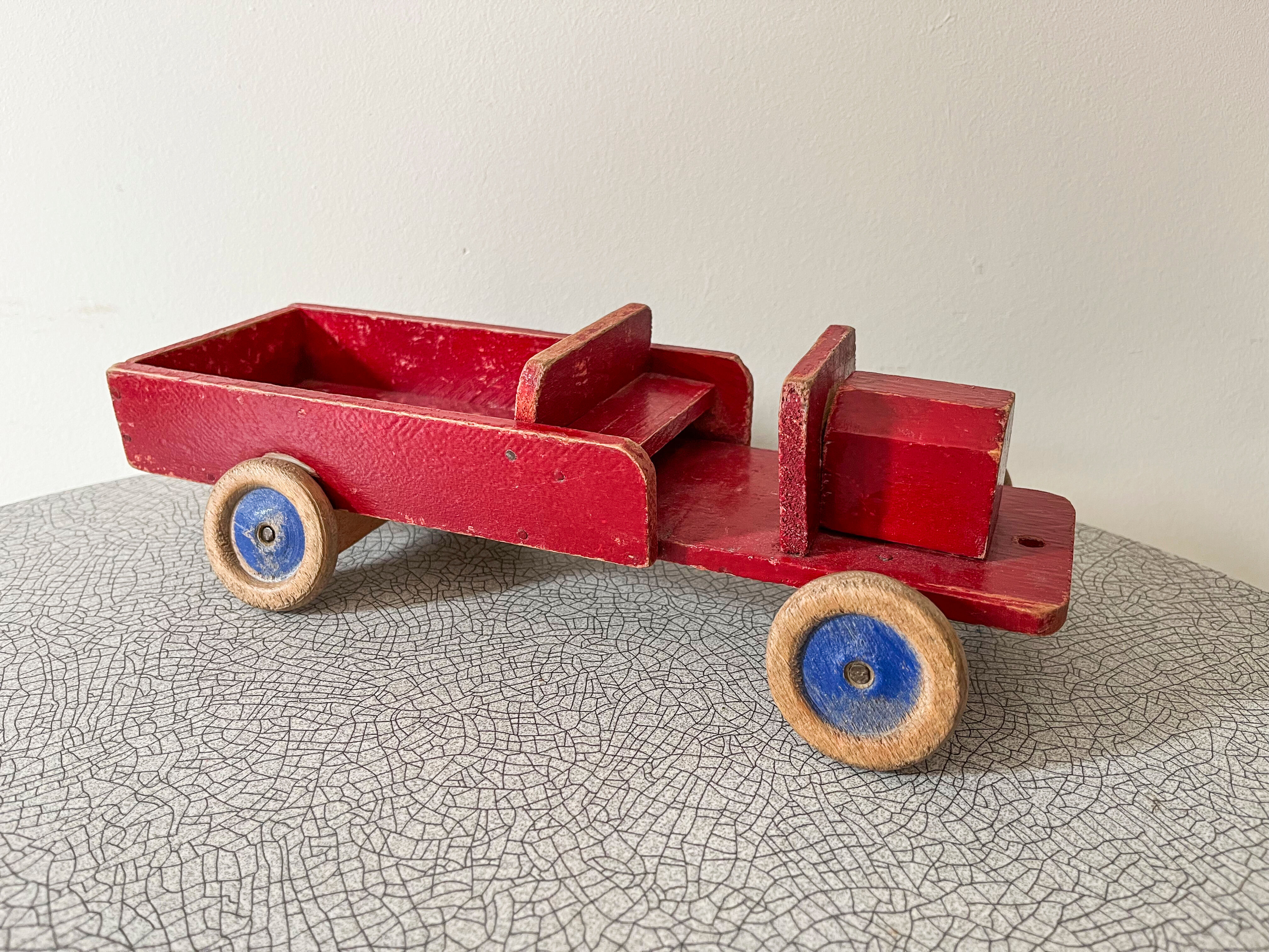 Red wooden flatbed truck. 1930s-40s