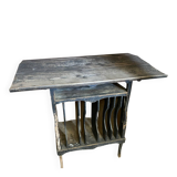 Antique writing desk, blackened wooden filing cabinet.