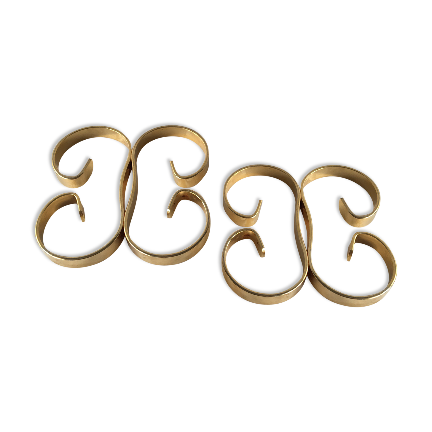 Pair of under-bottles volutes gold metal