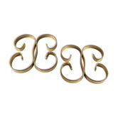 Pair of under-bottles volutes gold metal