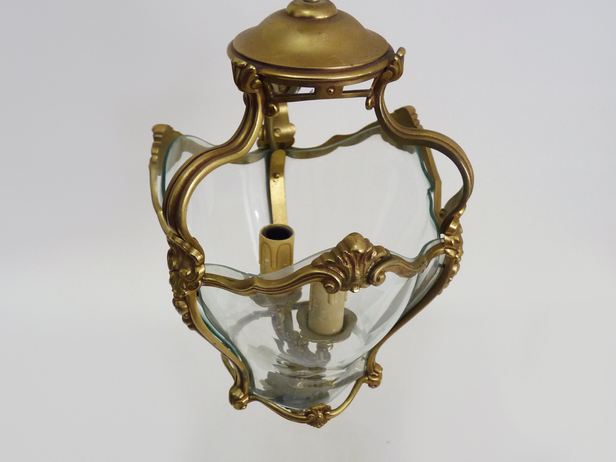 Old lantern with 3 faces, chandelier in gilded bronze and curved glass. Year 60