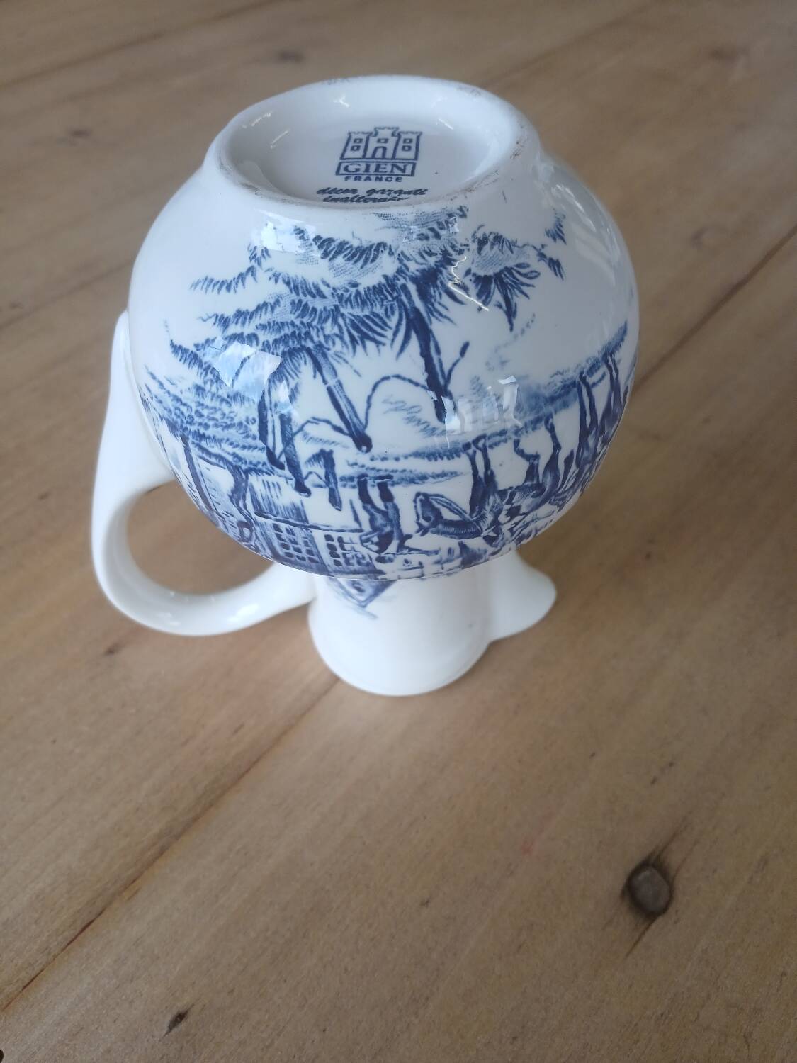 Small old pitcher in iron earth