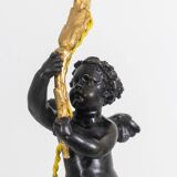 Lampe en bronze représentant un putti, socle en marbre. Circa 1880.