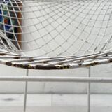 Pair of armchairs in white patinated mesh metal.