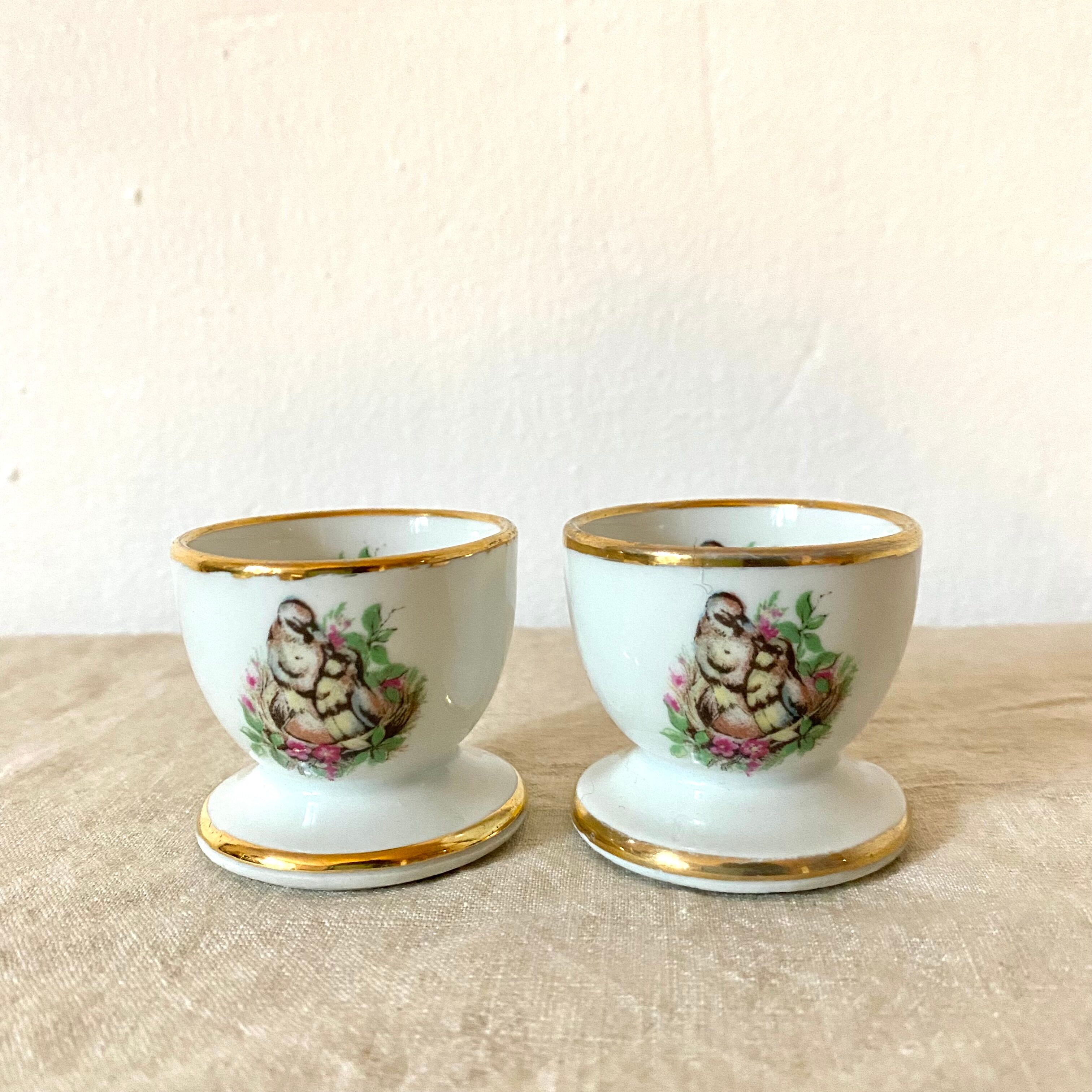 2 porcelain shells birds