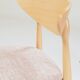 Set of 6 soft pink fabric dining chairs, Scandinavian design, natural wood.