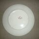 Beige earthenware plate with rose decoration and red garlands