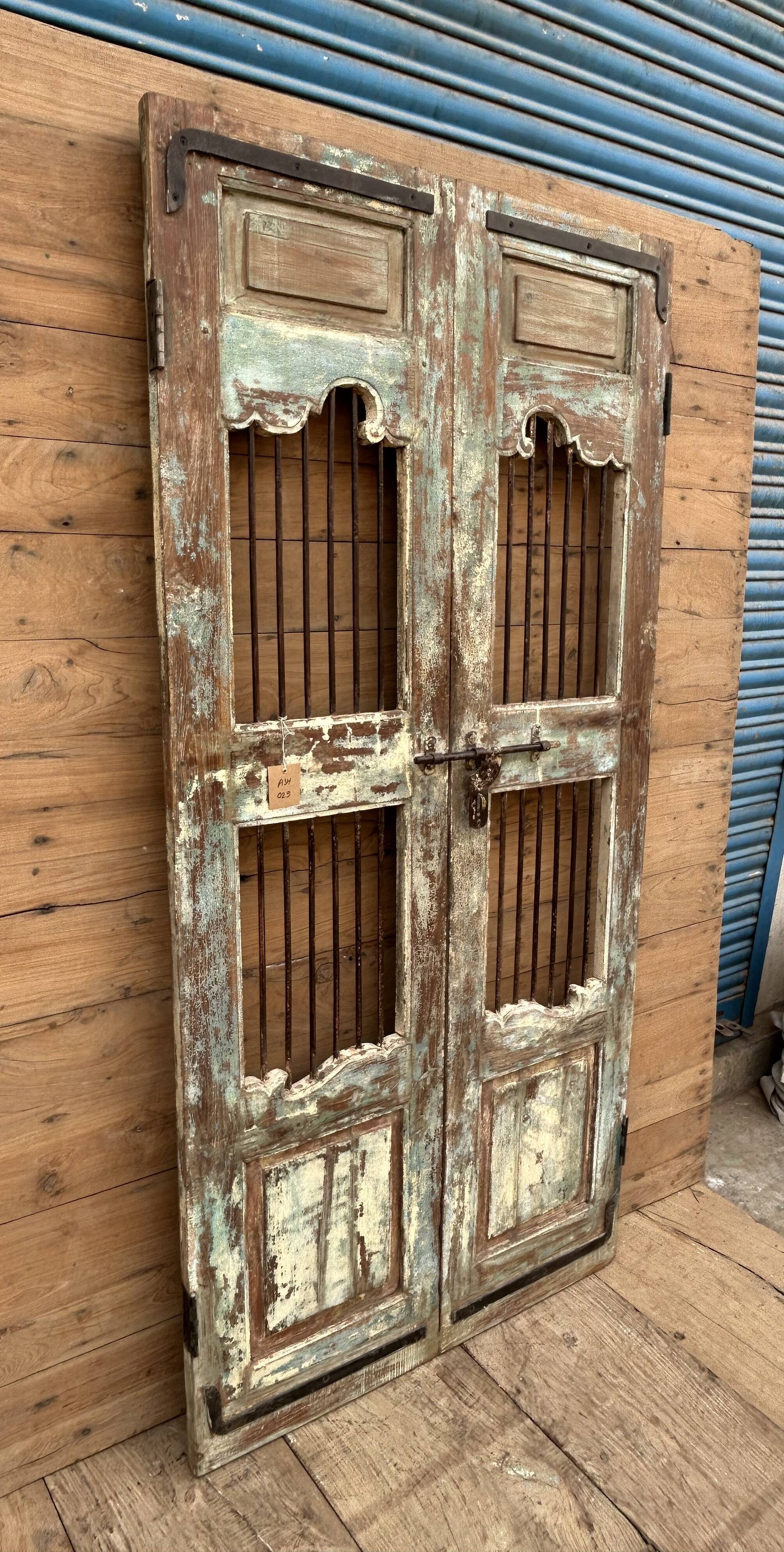Art Deco patio door in Burmese teak with original patina.