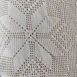 White cotton bedspread, crocheted sofa throw with star patterns