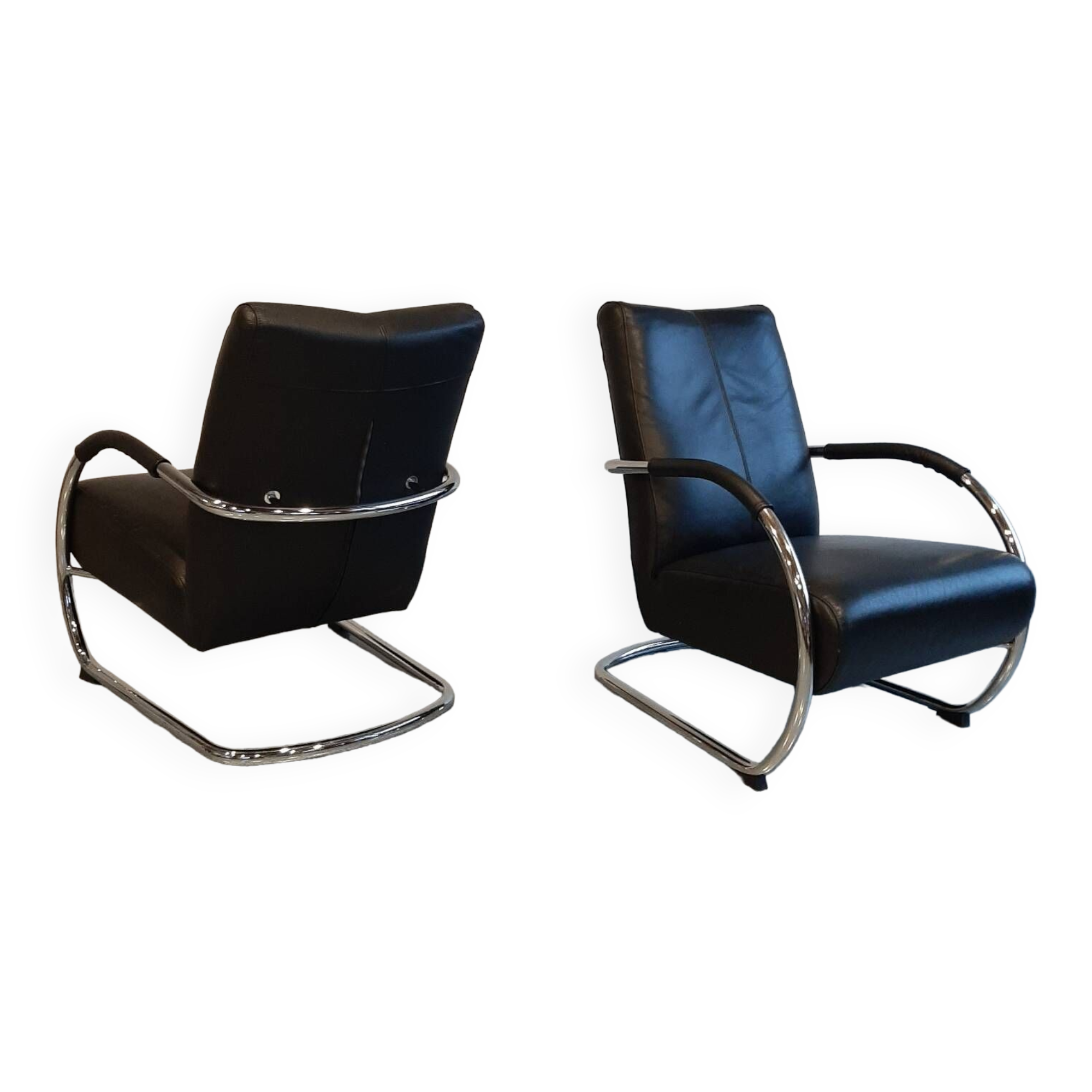Pair of tubular armchairs