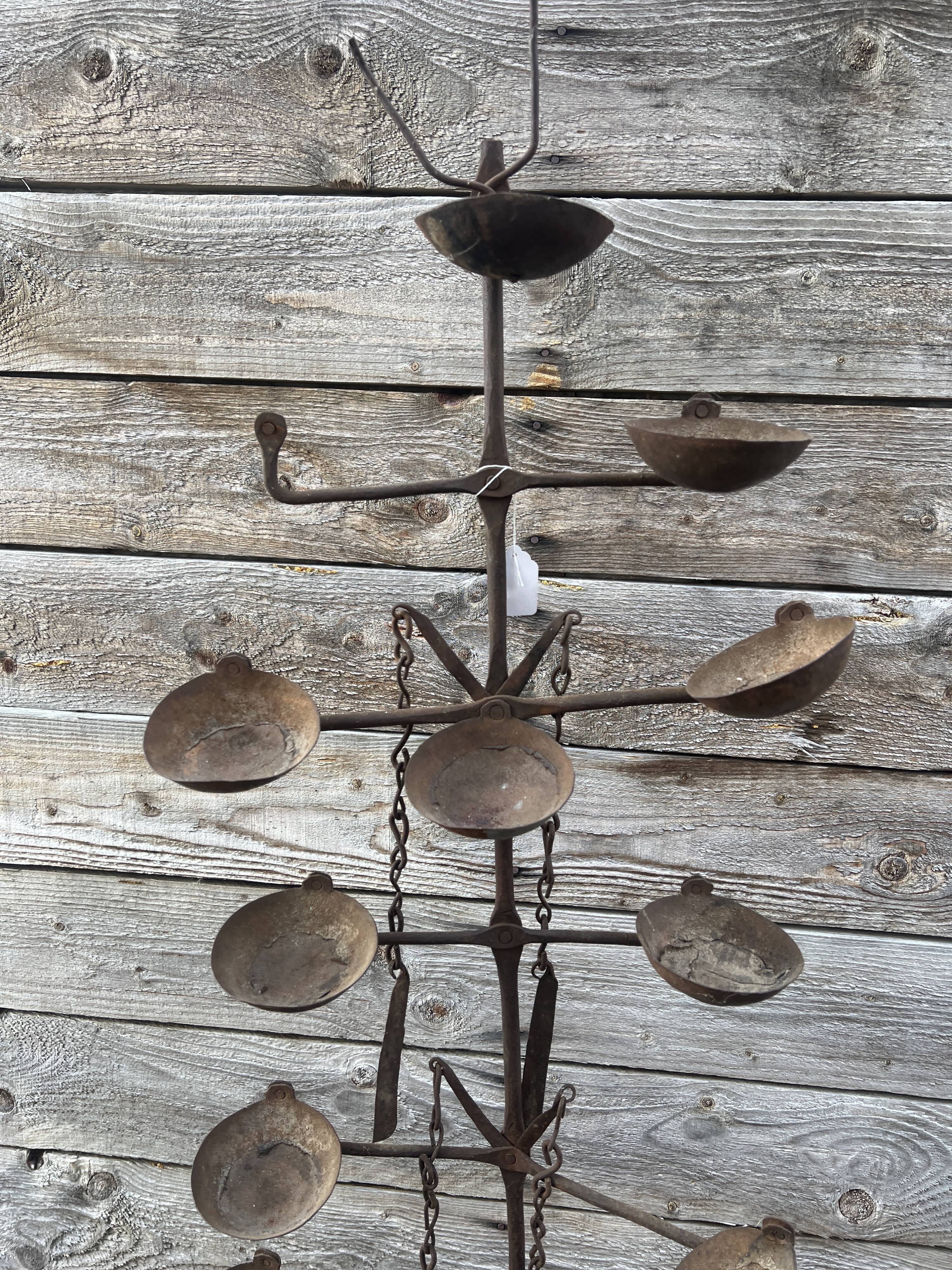 African oil lamps on stands