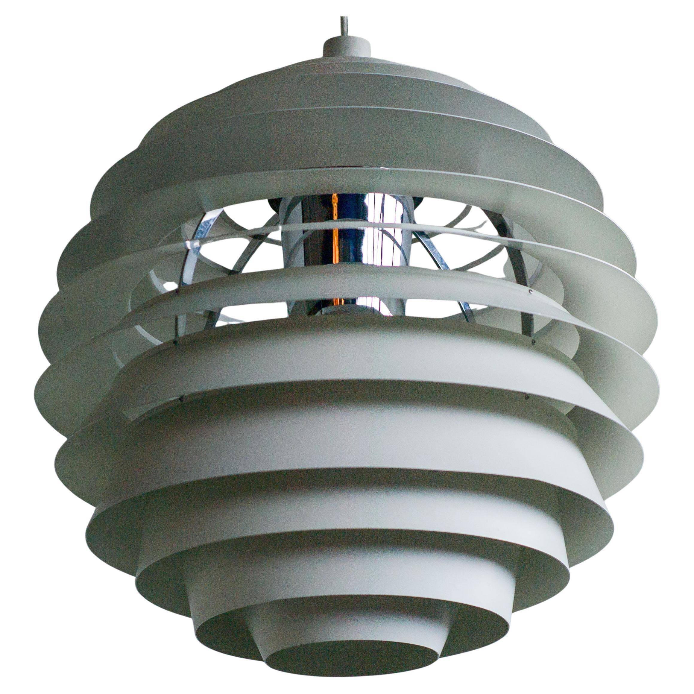 Large pendants from the early last century from the Louvre by Poul Henningsen for Louis Poulsen, 1962.