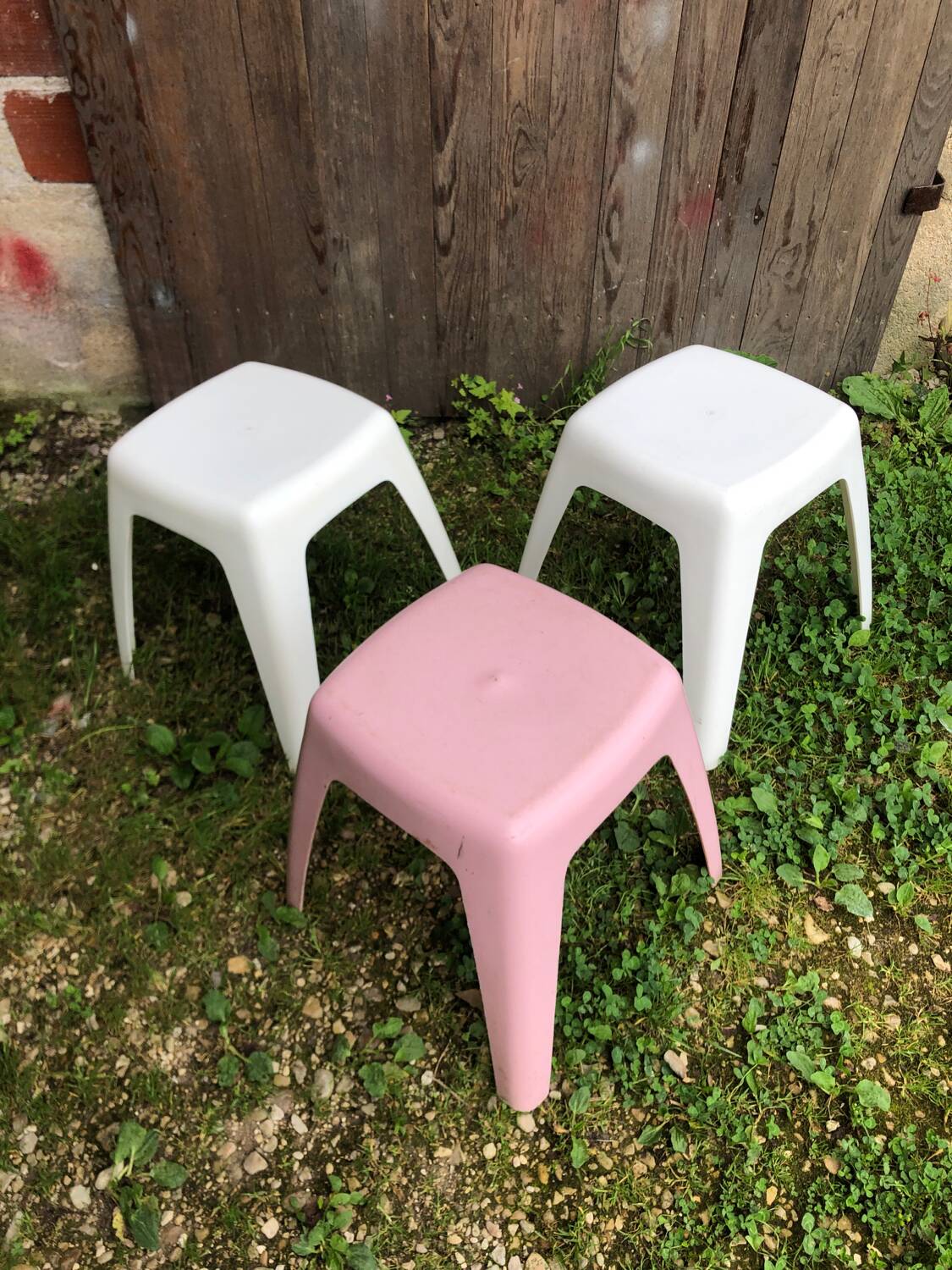 Series of 3 old vintage white & pink plastic stools