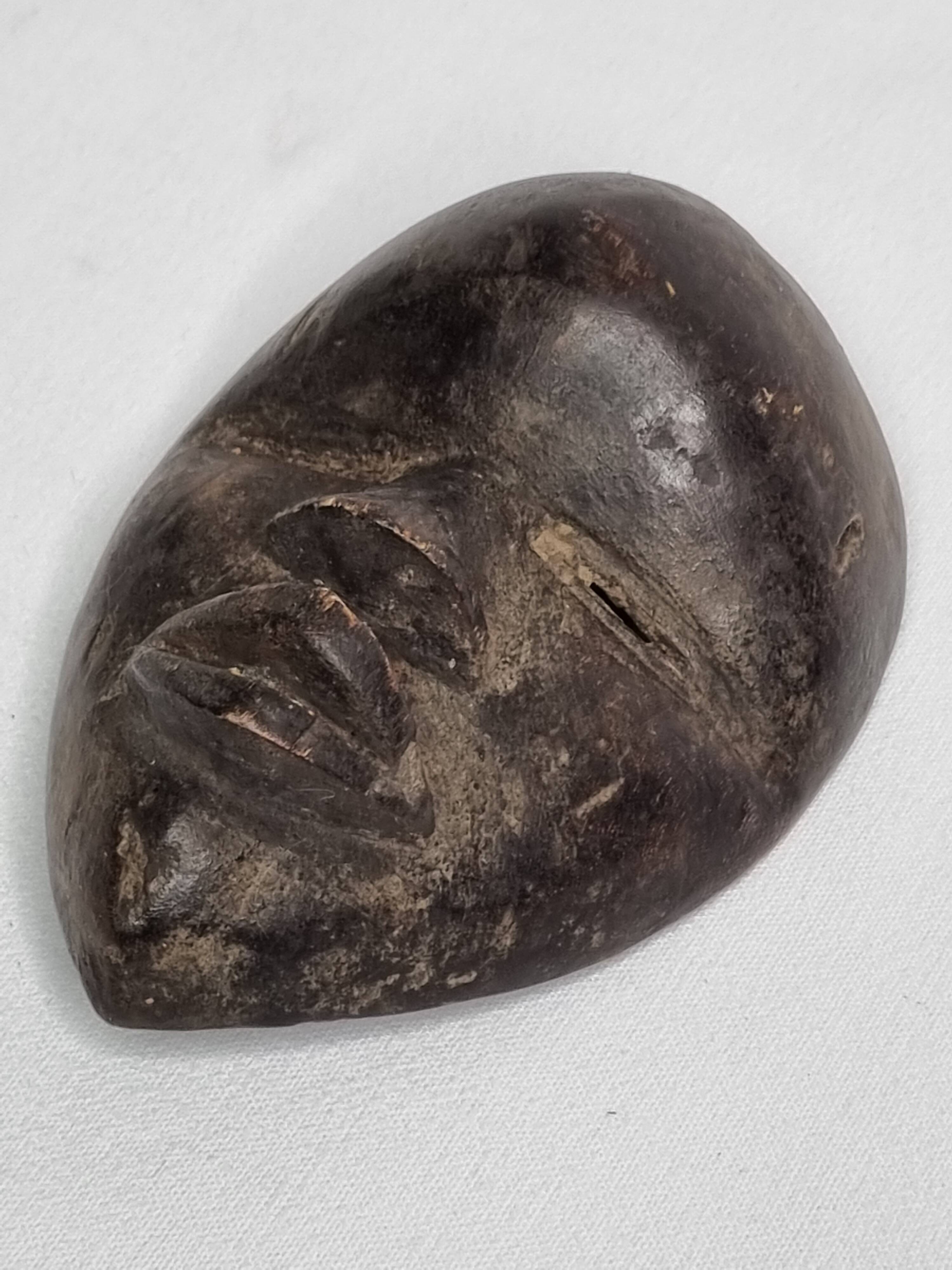 Passport mask, Dan in patinated wood – Ivory Coast, 20th century, 13 cm