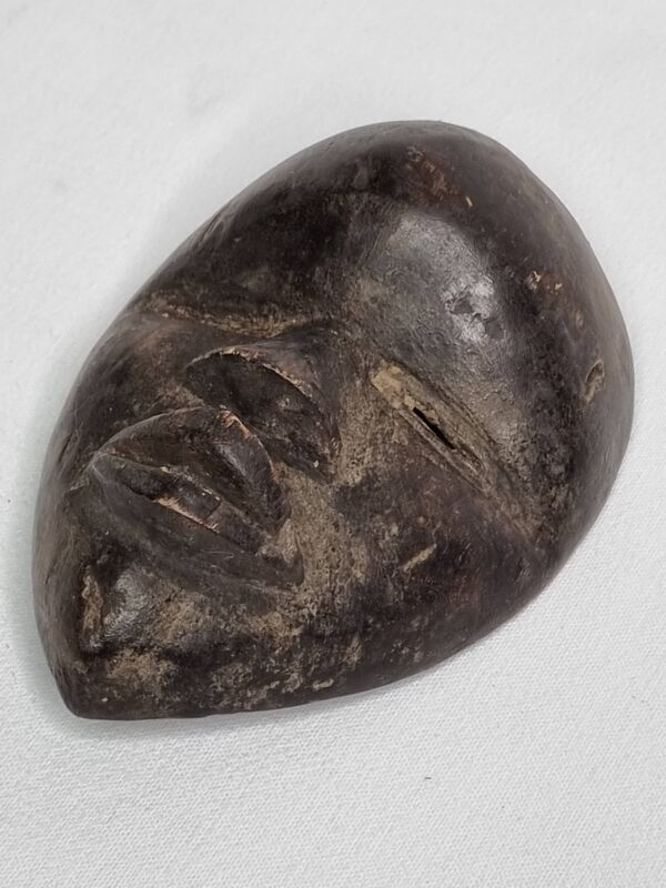 Masque passeport, Dan en bois patiné – Côte d’Ivoire, XXe siècle, 13 cm