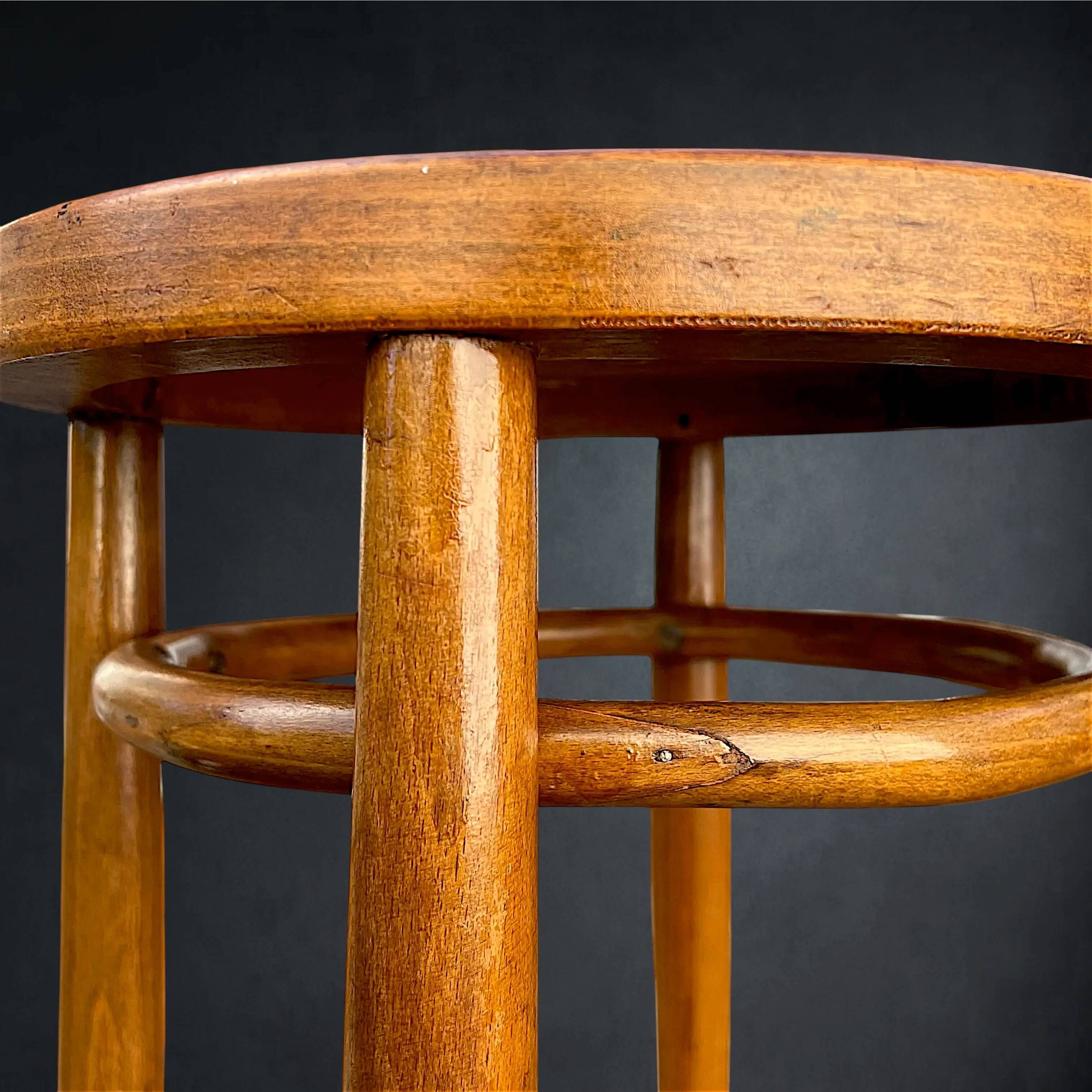 Antique high bistro stool in curved wood with a floral decorated top, Thonet style – around 1900