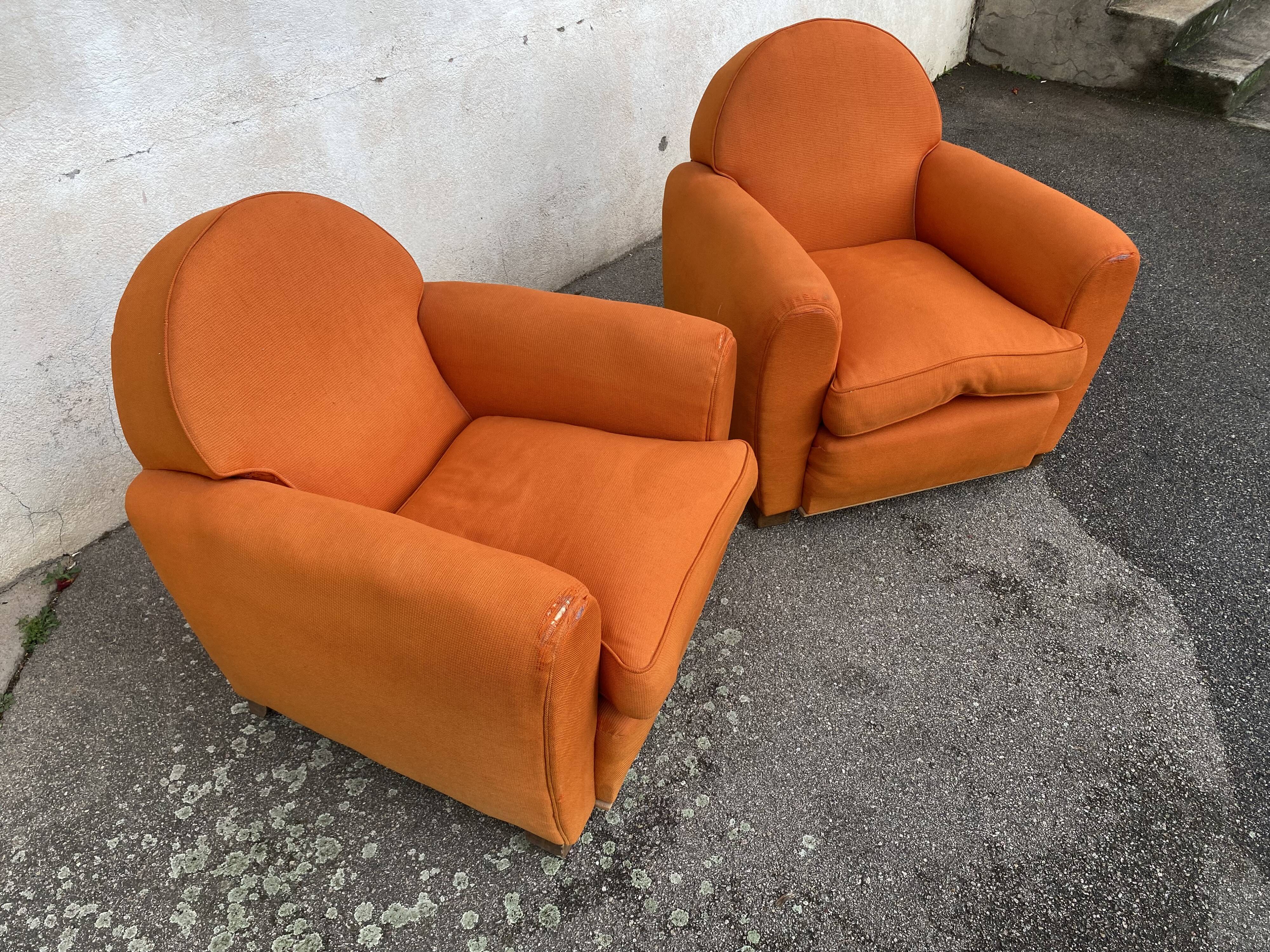 Pair of vintage orange club chairs
