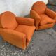 Pair of vintage orange club chairs
