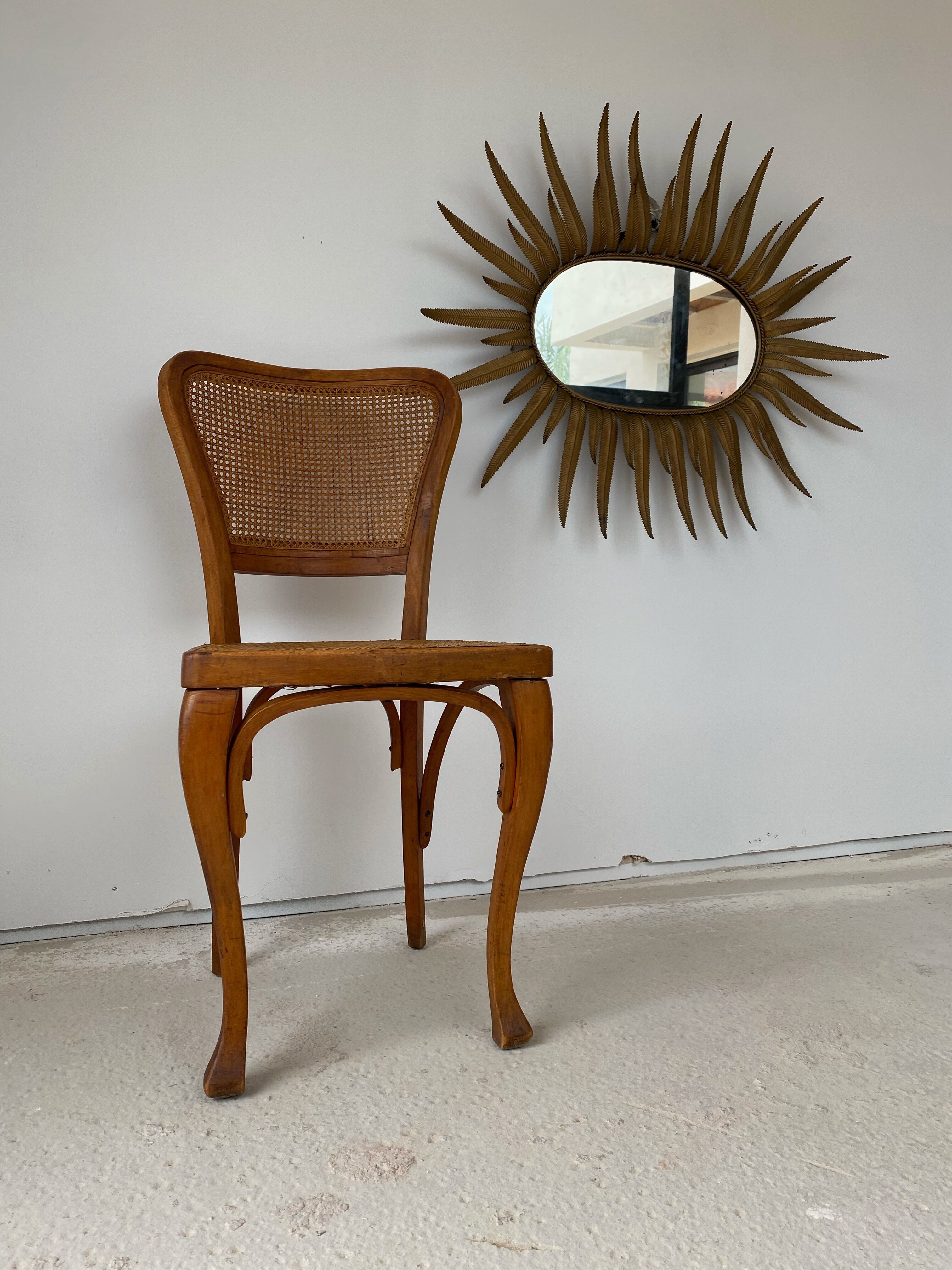Vintage copper metal sun mirror oval shaped from the 1960s