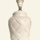 White ceramic lamp base from Manises, intertwined geometric relief.