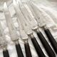 6 antique black wooden table knives La Trompette, late 19th century