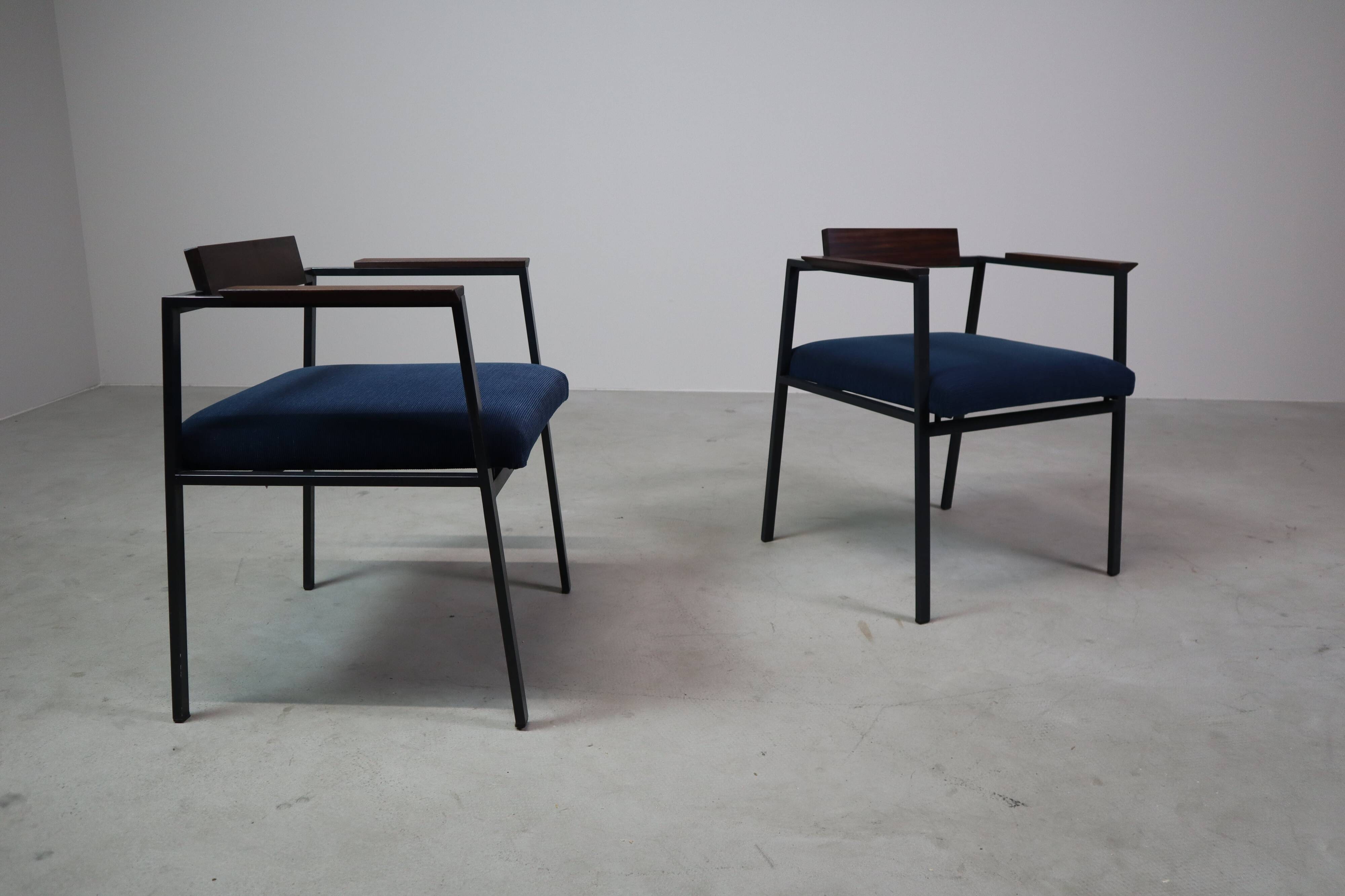 Pair of Postmodern armchairs in steel and mahogany, 1970s