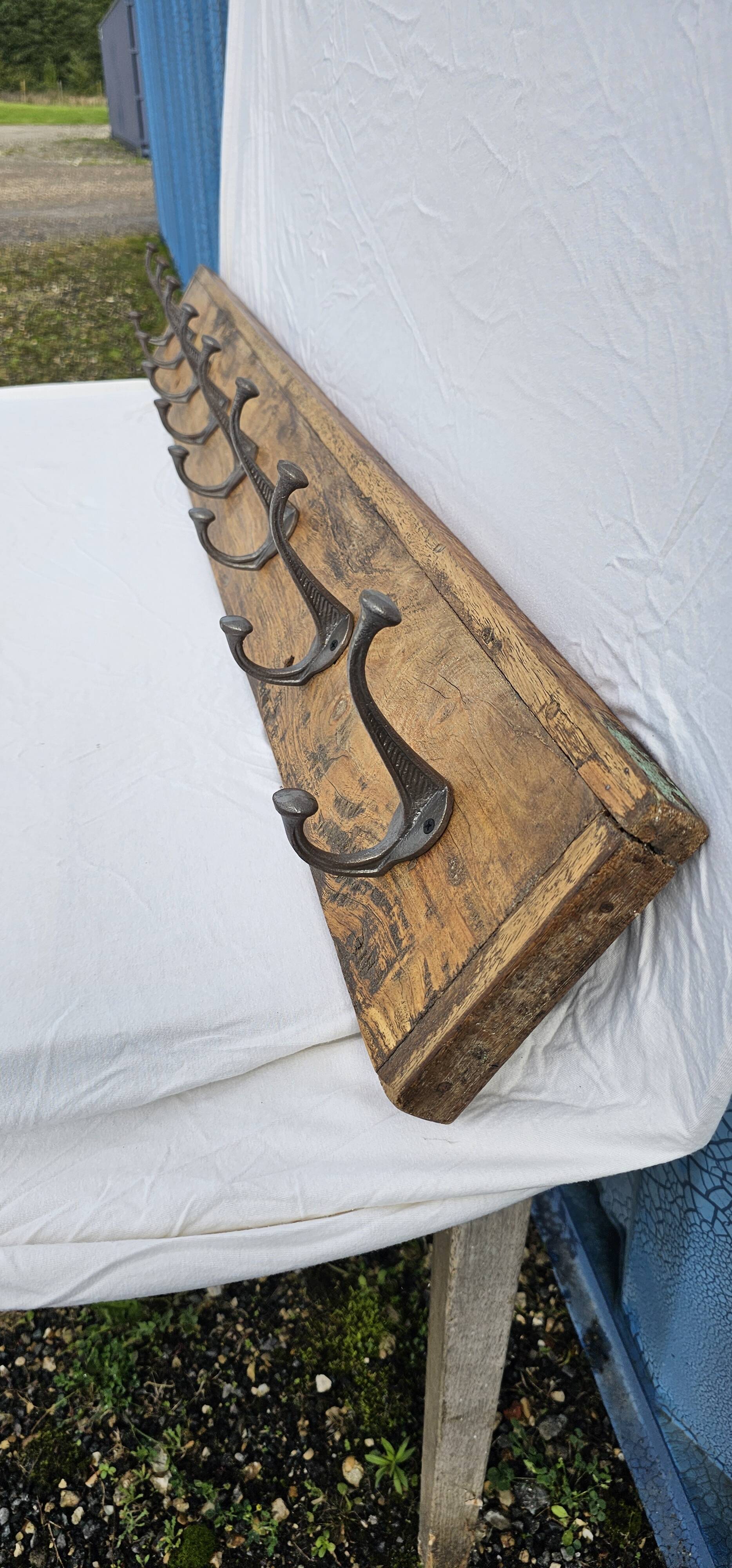 Teak coat rack with 8 double cast iron hooks
