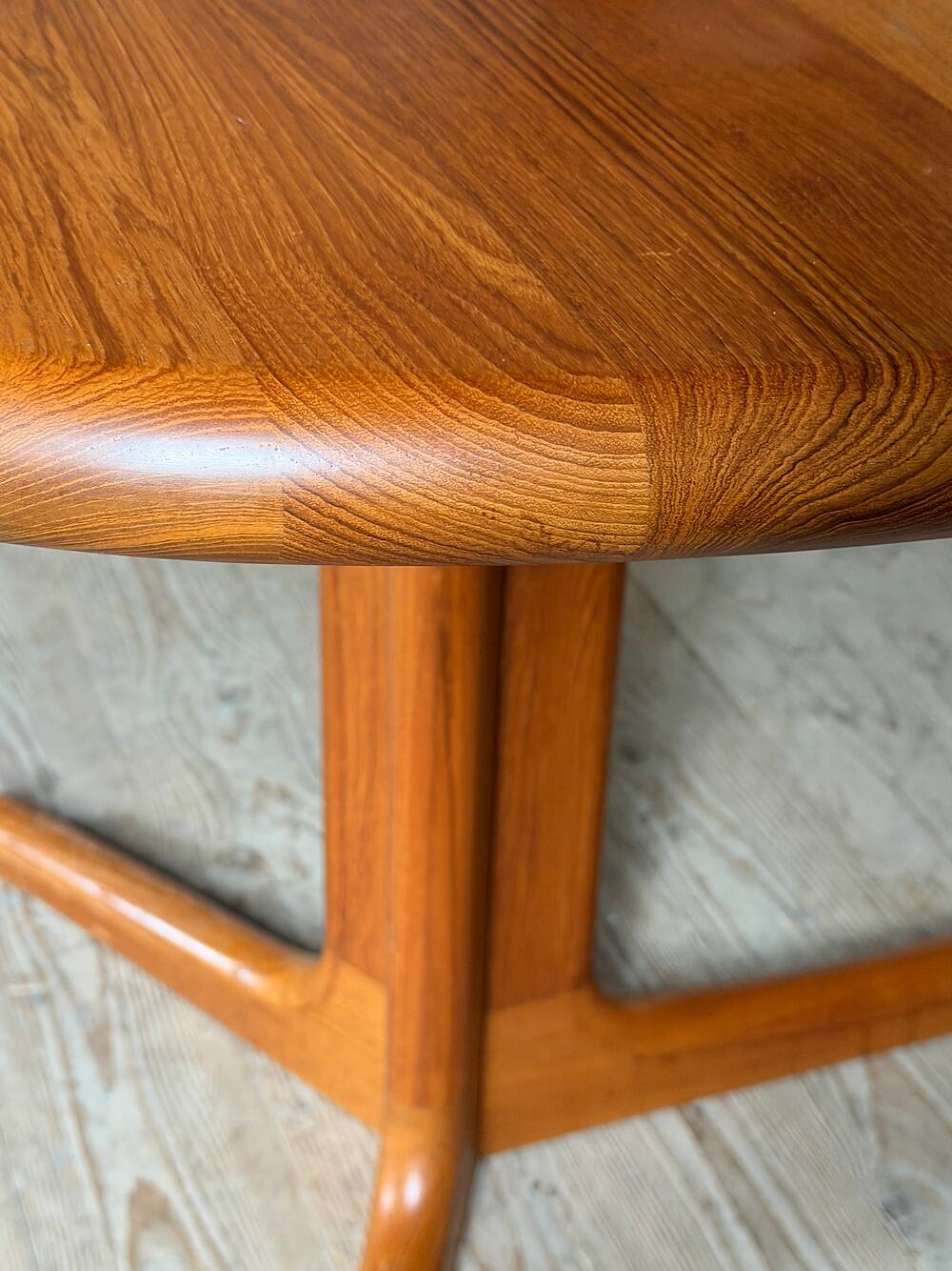 Vintage oval teak Scandinavian table with a central star base from Glostrup.