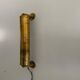 Small simple cylindrical brass wall light from the mid-century, 1950s, Germany.