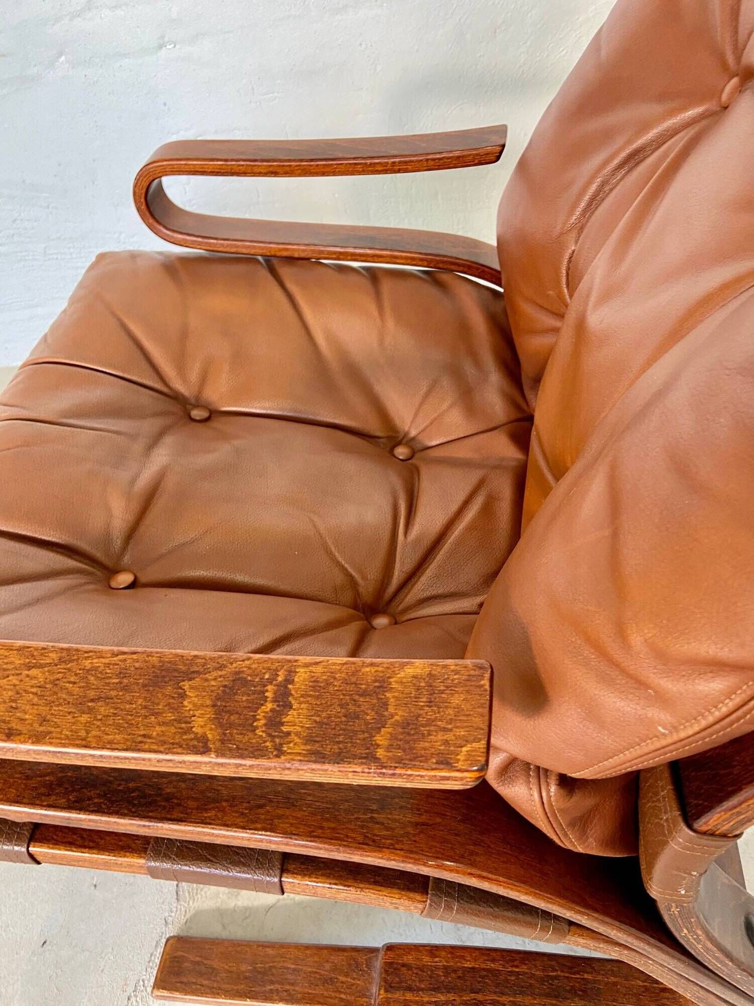 Vintage scandinavian cognac lounge chair by oddvin rykken 1960s