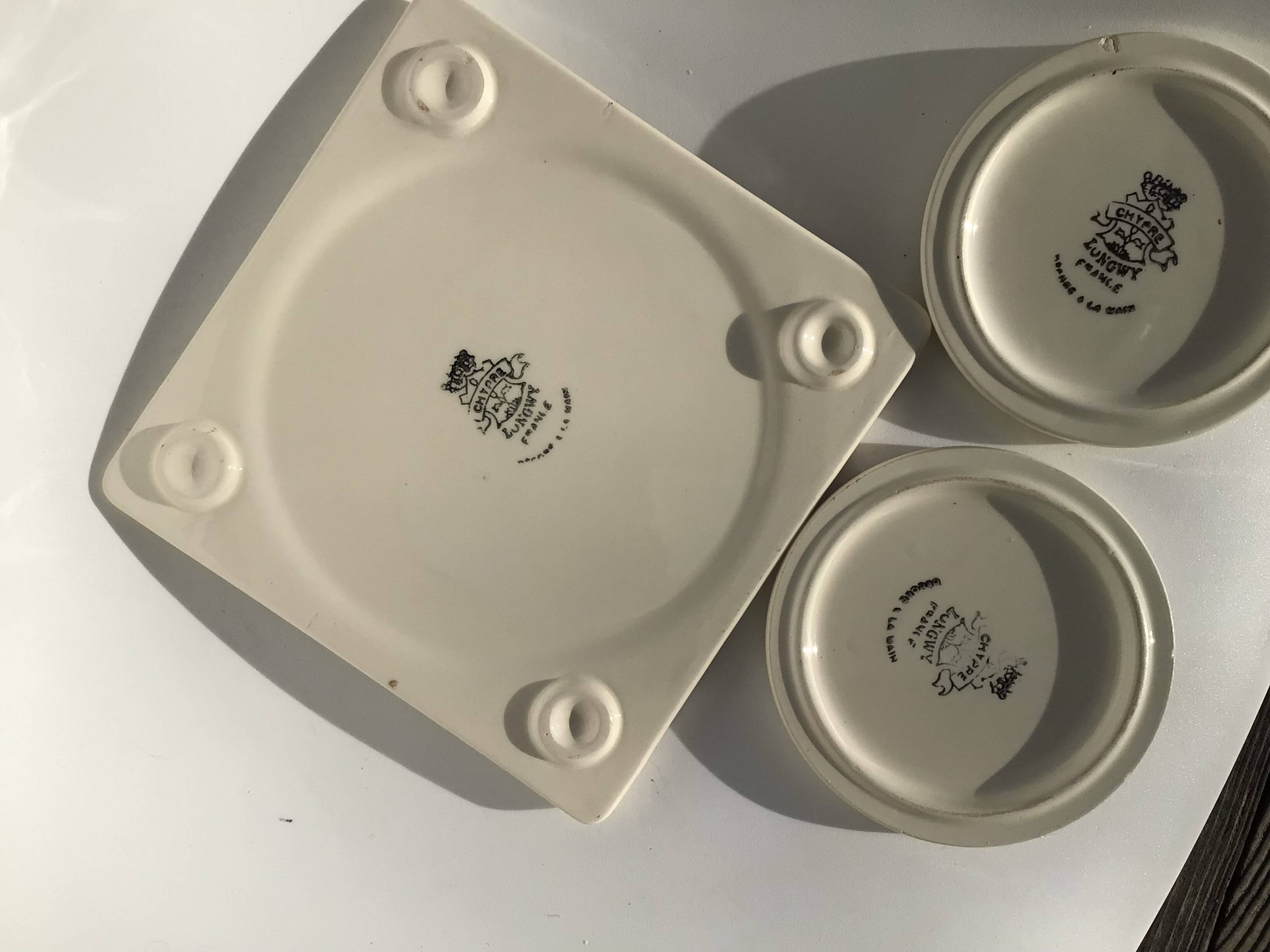 Longwy Chypre cream trivets and bottles