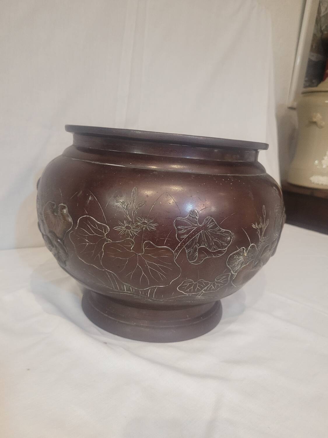 Large bronze plant pot
