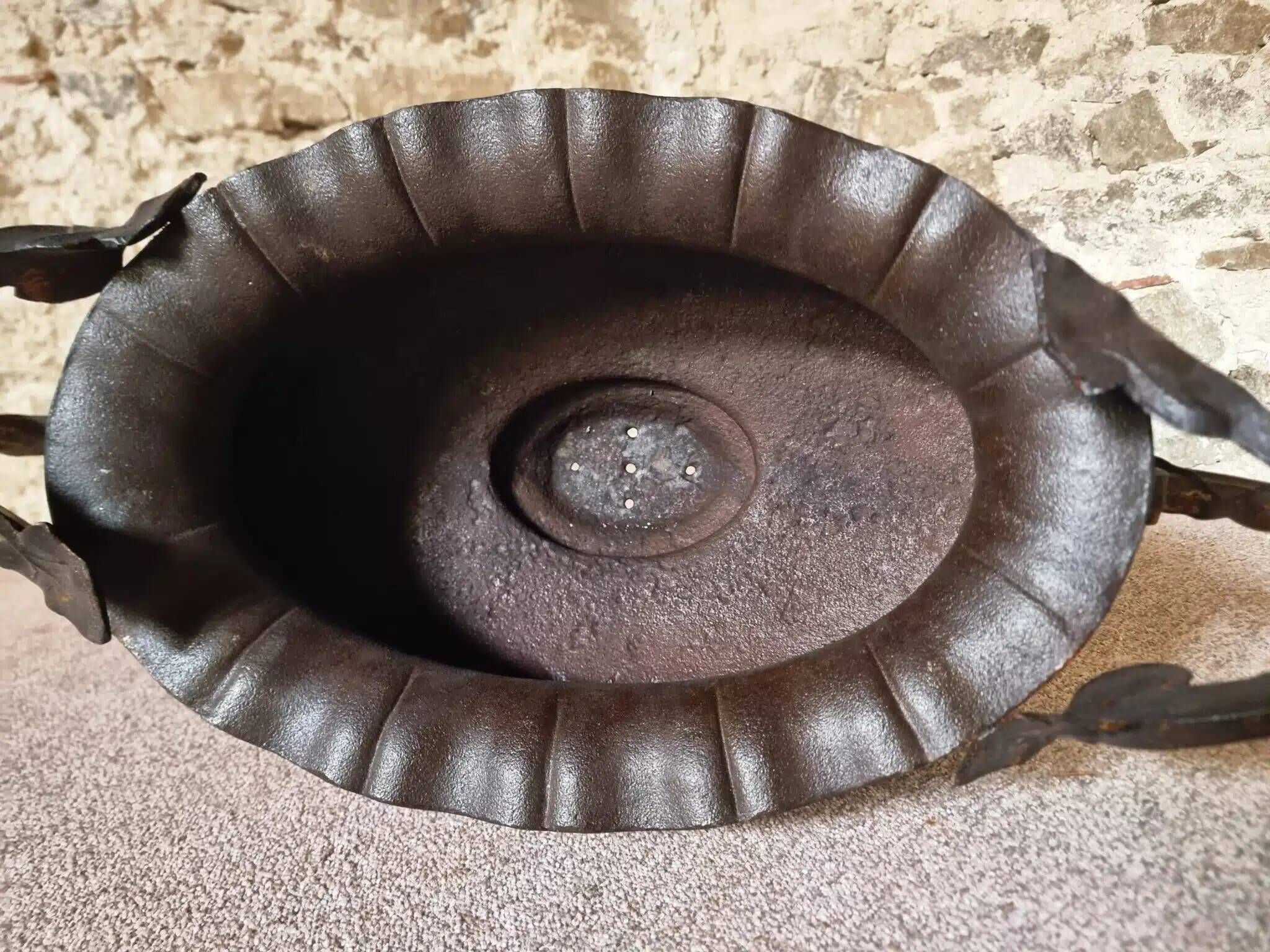 Large antique cast iron planter on a stand, brown-gold patina, France, circa 1900.