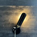 Old black metal and brass wall light, adjustable, 1930s.