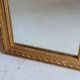 Long miroir en bois et stuc doré vintage