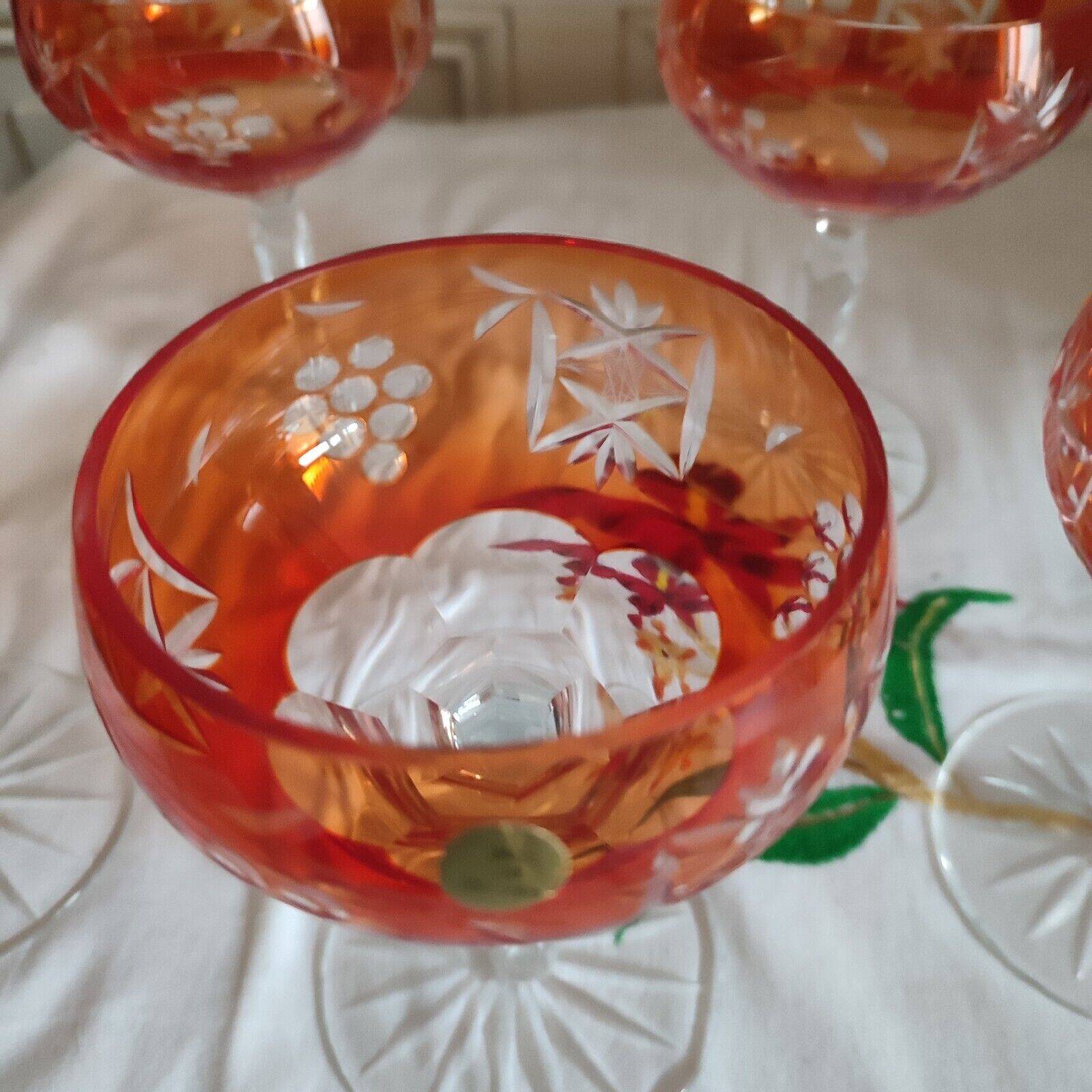 Five antique orange cut crystal champagne glasses with grape cluster decoration Poland