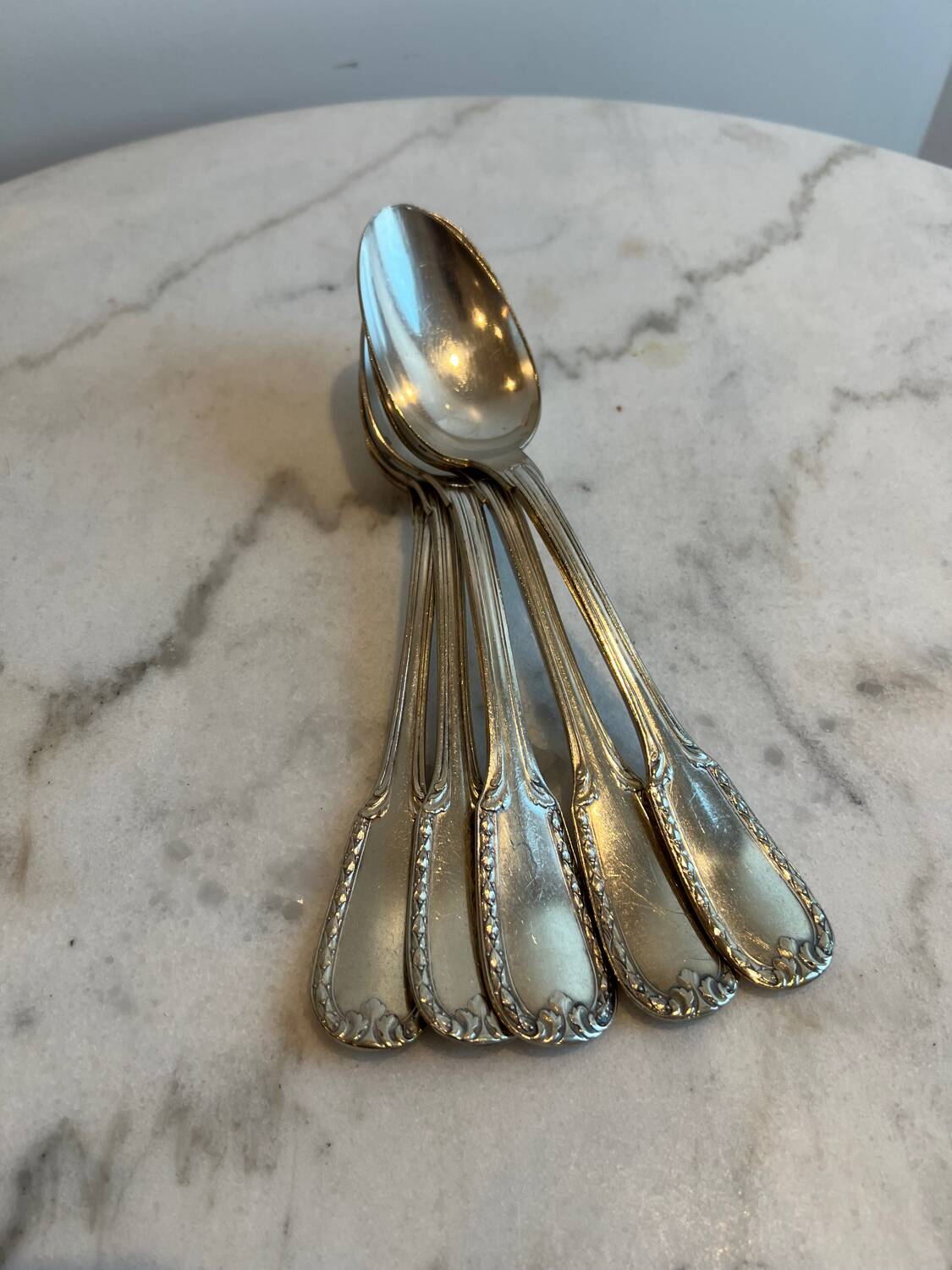 Set of five Bonlanger silver spoons
