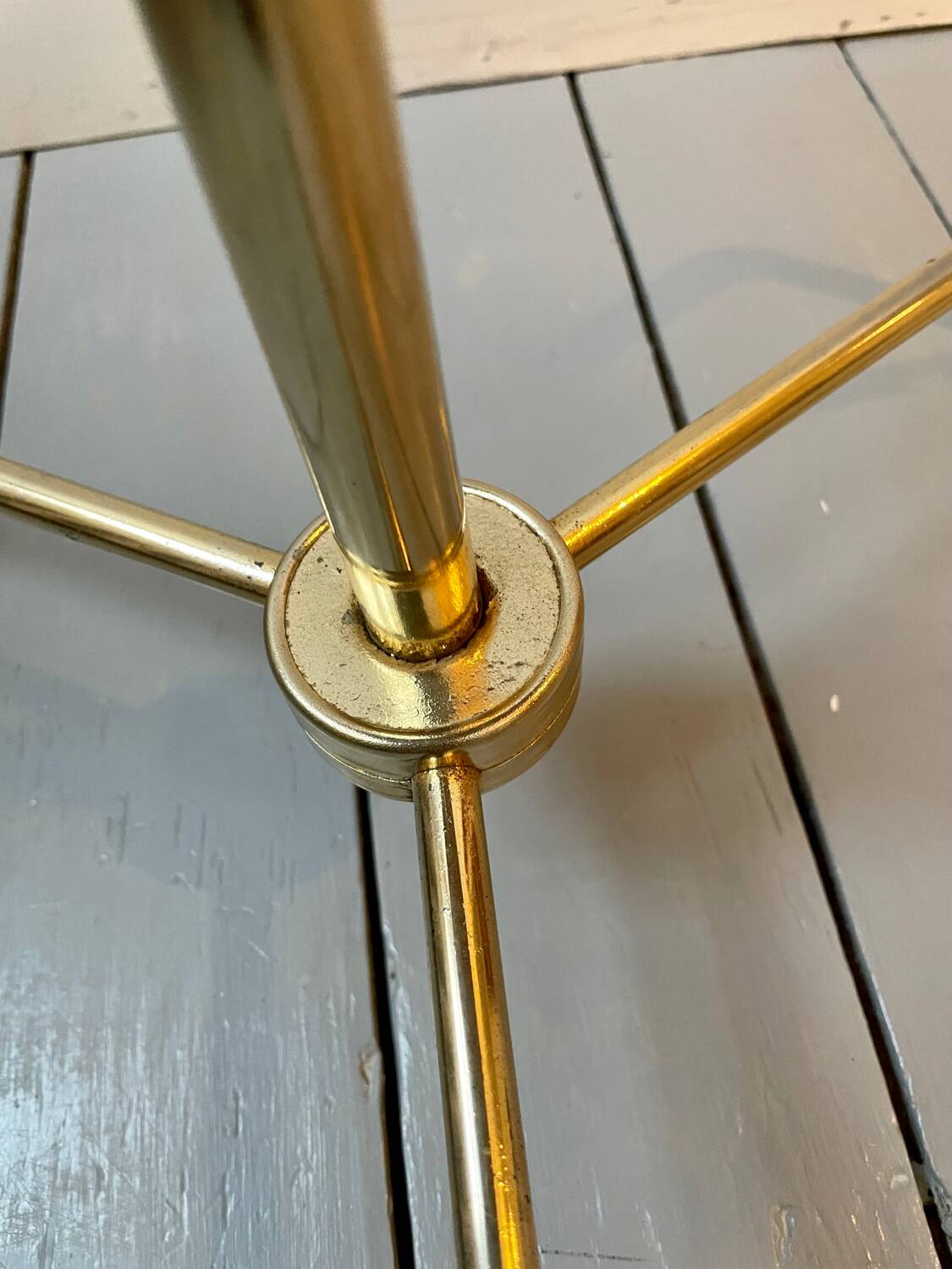 Vintage tripod pedestal table in gold metal