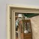 Antique mirror with beige patina