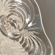 A set of beautiful rock crystal glass candle holders from Swedish Orrefors. Estimated 1970s.