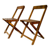 Two vintage wooden folding chairs, circa 1960
