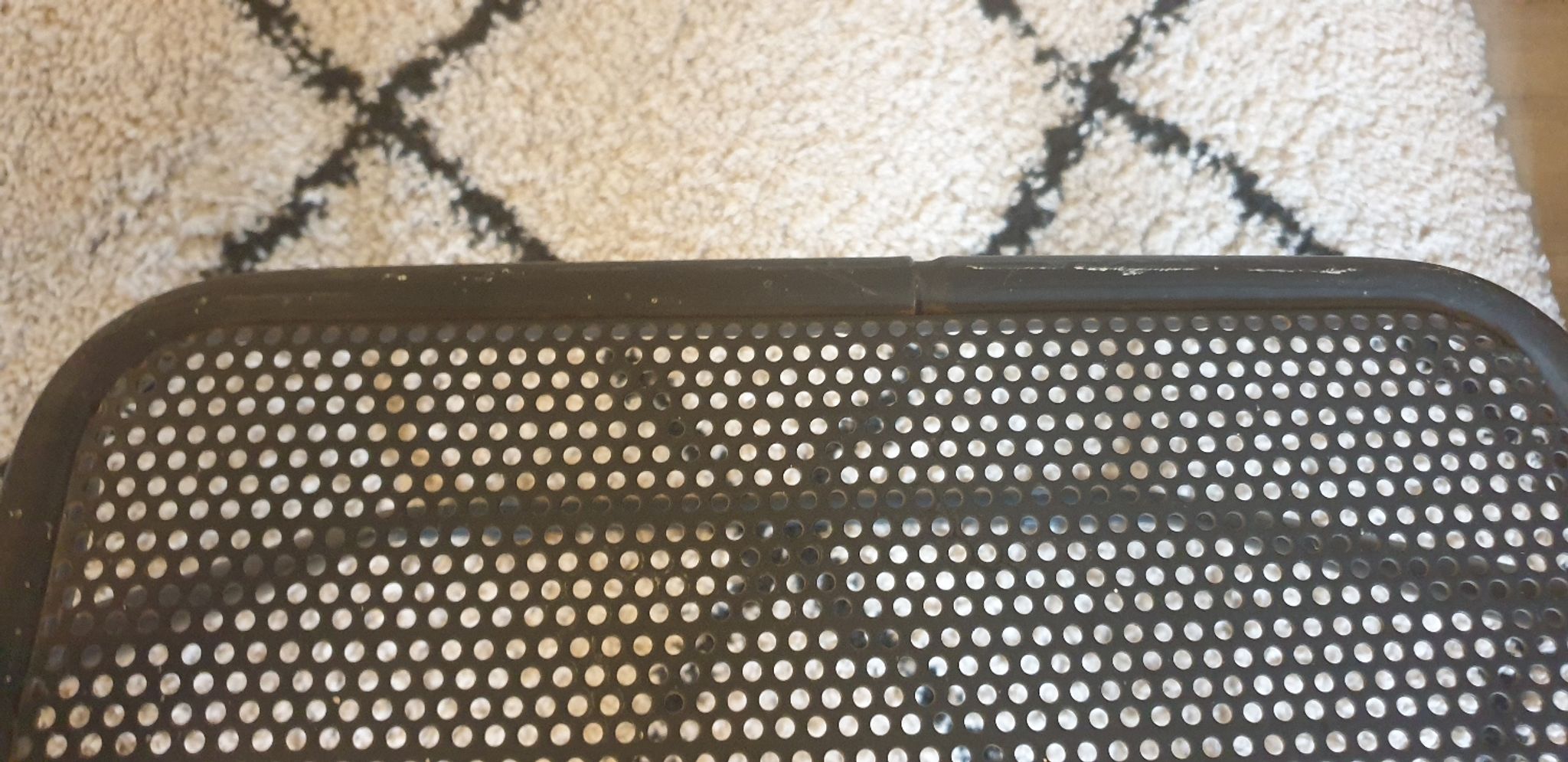 Pair of folding chairs in perforated metal