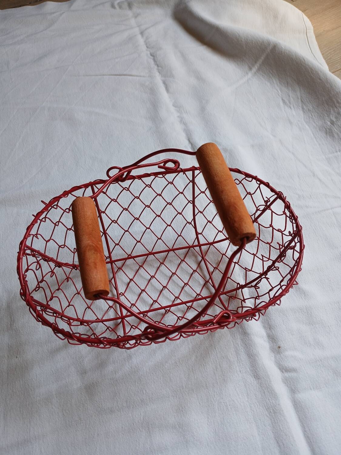 Small red metal basket