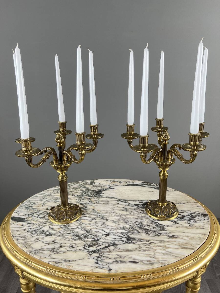 Pair of gilded bronze candelabra with 5 lights, Louis XVI style, 20th century.