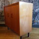 Vintage shoe cabinet with accordion doors