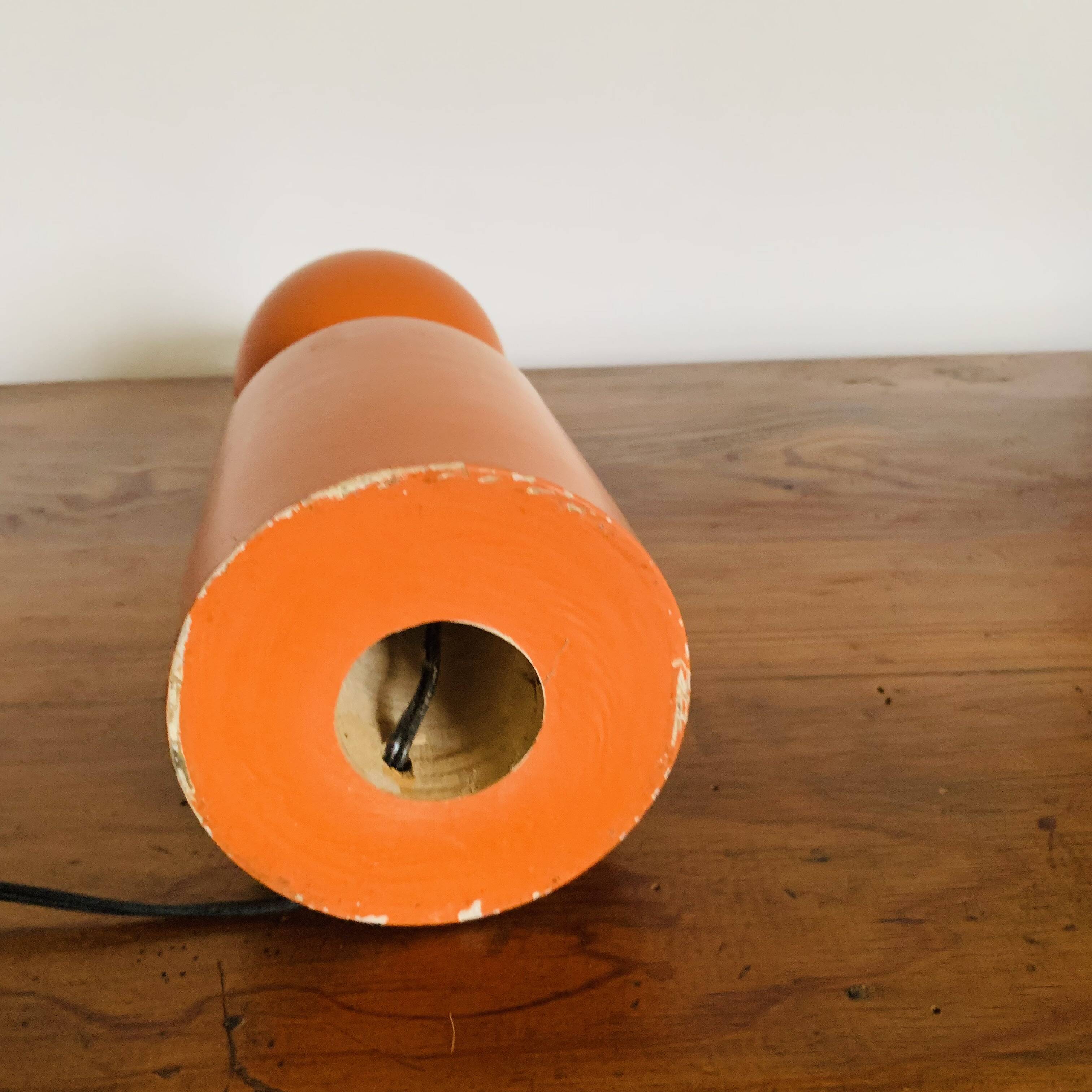 Orange turned wooden lamp base