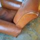 Ancien fauteuil club en cuir, vers 1940 style art déco