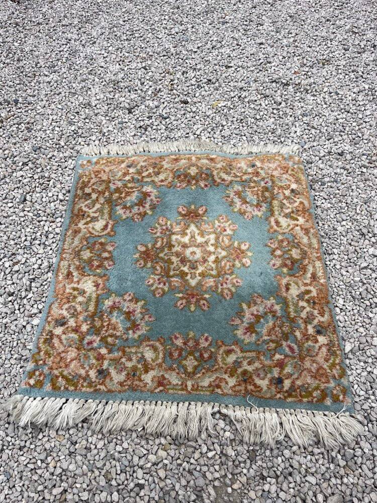 Small antique Persian rug
