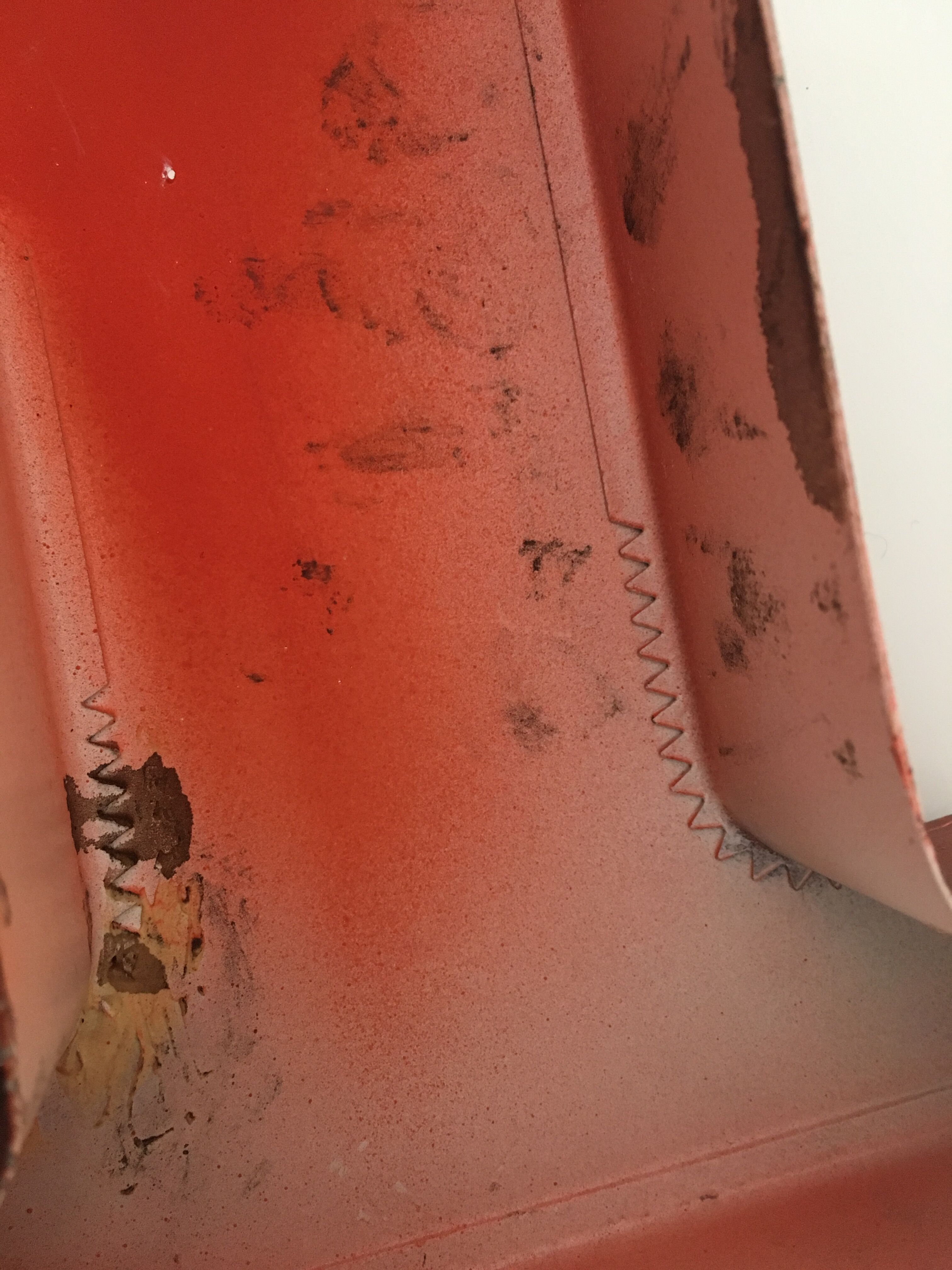 Red metal "F" sign letter