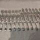 12 forks, 12 fish knives, silver-plated metal, rocaille pattern